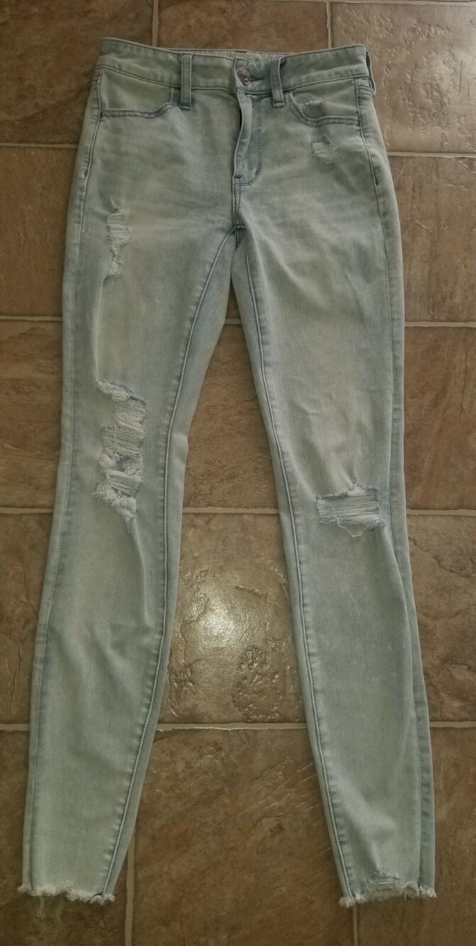 American Eagle women sz 2 Hi Rise Jegging Jeans distressed stretchy 3848
